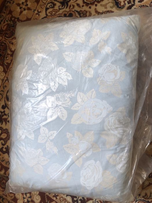 Подушки и одеяла пуховые