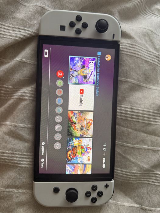 Nintendo Switch OLED с dock, аксесоари и игри