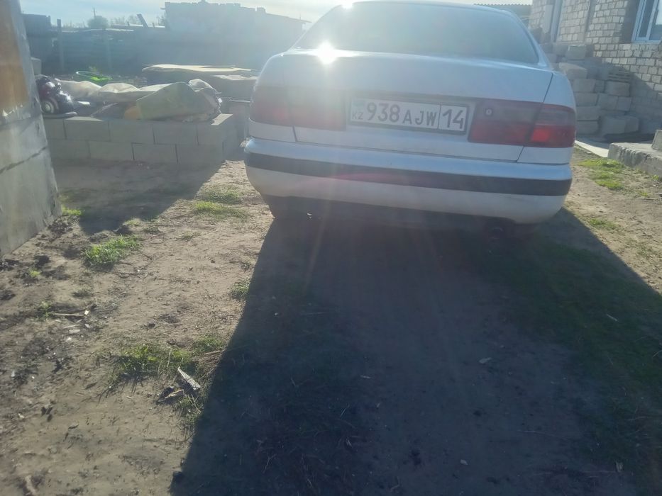 Тойота Карина е 1.3