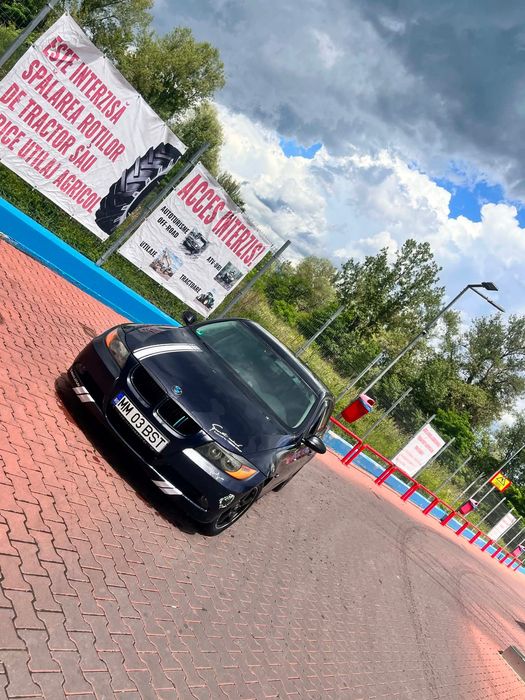 BMW e 90 2.0 benzină 2007 acte valabile geamuri electrice navigație automat dublu clik în pedală