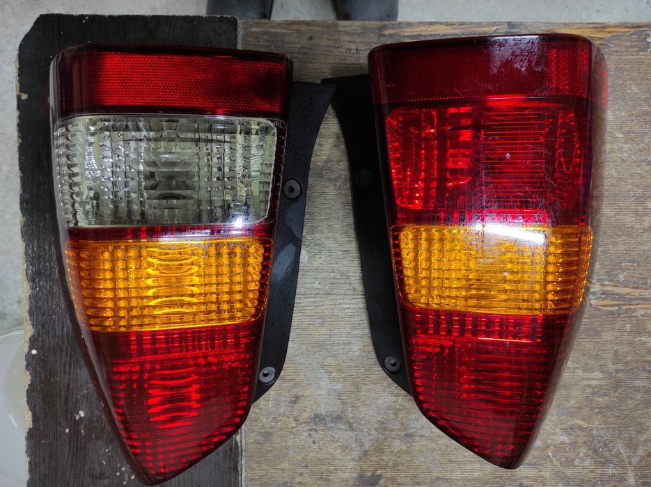Фонарь задний правый левый Мазда Трибут