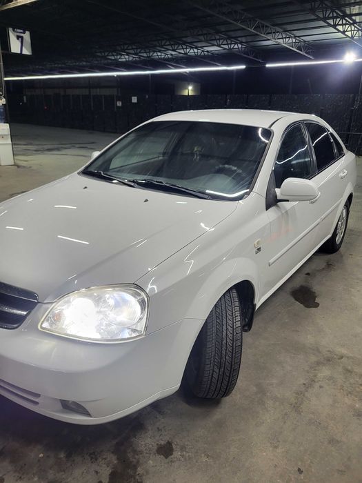 Lasetti 1.8 xolati ideal sotiladi 1 qo'l moshina kraskasi tozza