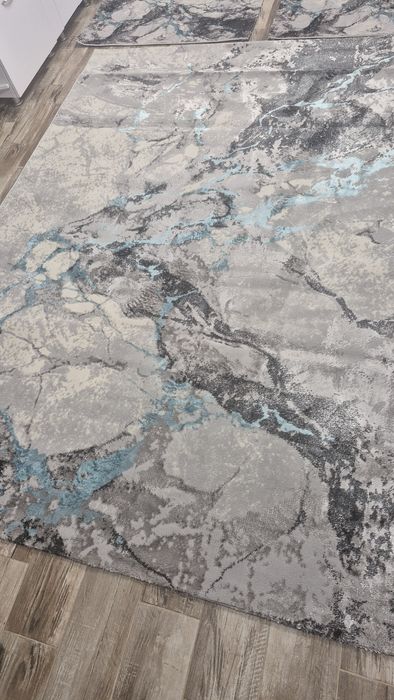 Vand set covoare noi