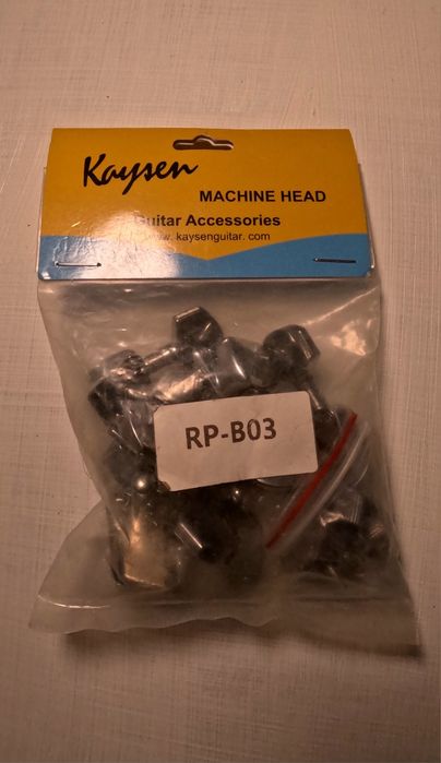 Mashhur Fishman Equalayzeri mikrafonlar, tuner va gitara quloqlari