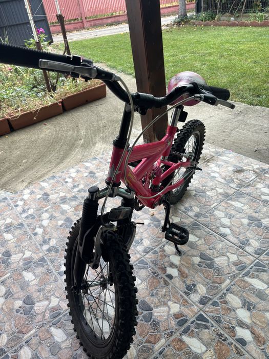 Bicicleta fete cu suspensii fata spate
