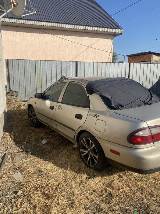 Продам по запчастям мазда 323