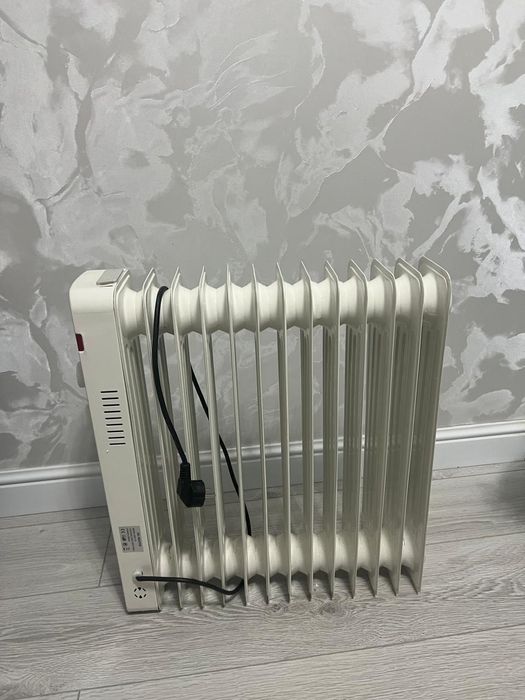 Масляный обогреватель.
