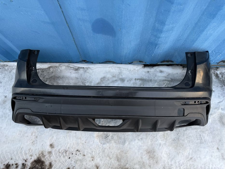 Задний бампер Geely Coolray с 2018 по 2024