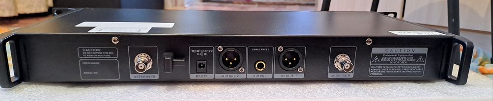 Продам новый микрофон SHURE QLXD4