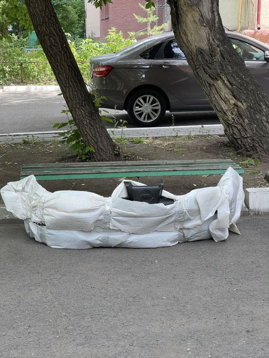 Передний бампер Nissan Tiida