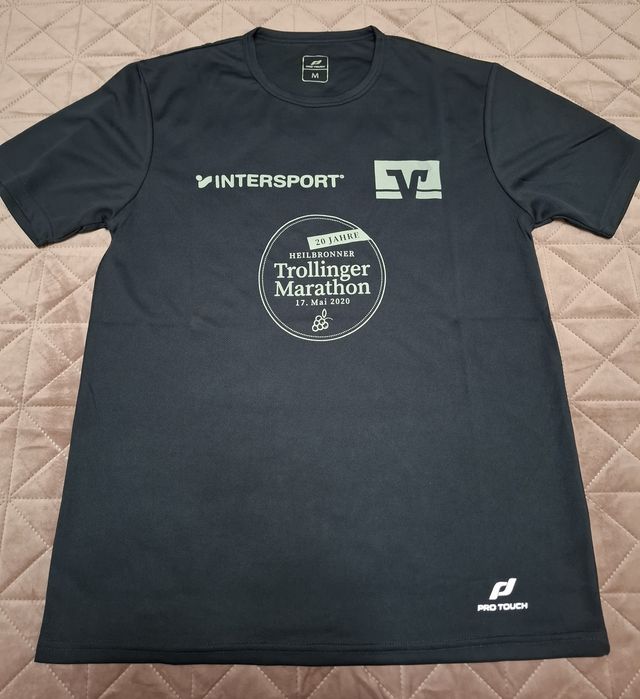 Tricouri noi M, INTERSPORT  4 bucăți 20 lei
