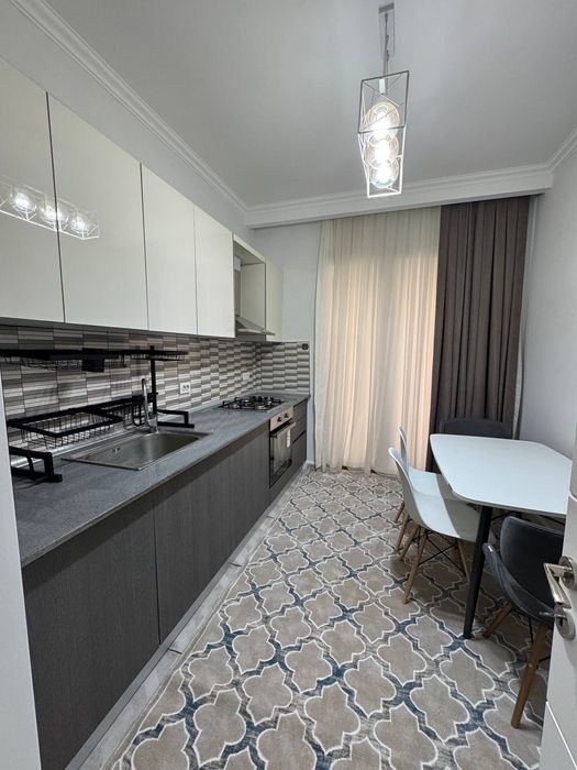 Istanbul City Продается 2 комнатная квартира ремонт А.Каххара