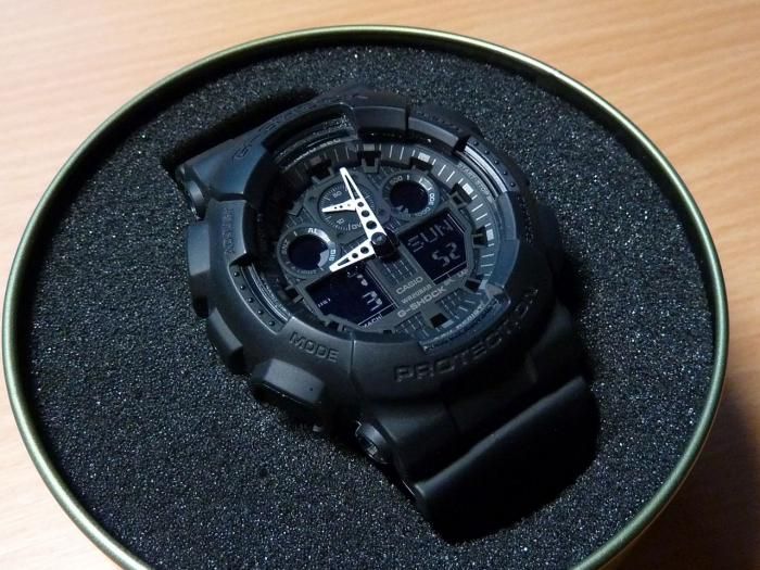 Мъжки часовник Casio G-SHOCK GA-100, черен, червен, внос от Германия