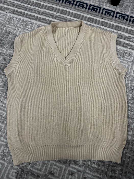 Жилетка теплая дешево