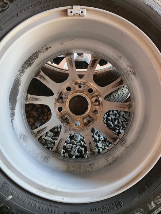 Set jante BMW originale 16 cu anvelope Continental M + S  205/60 R16