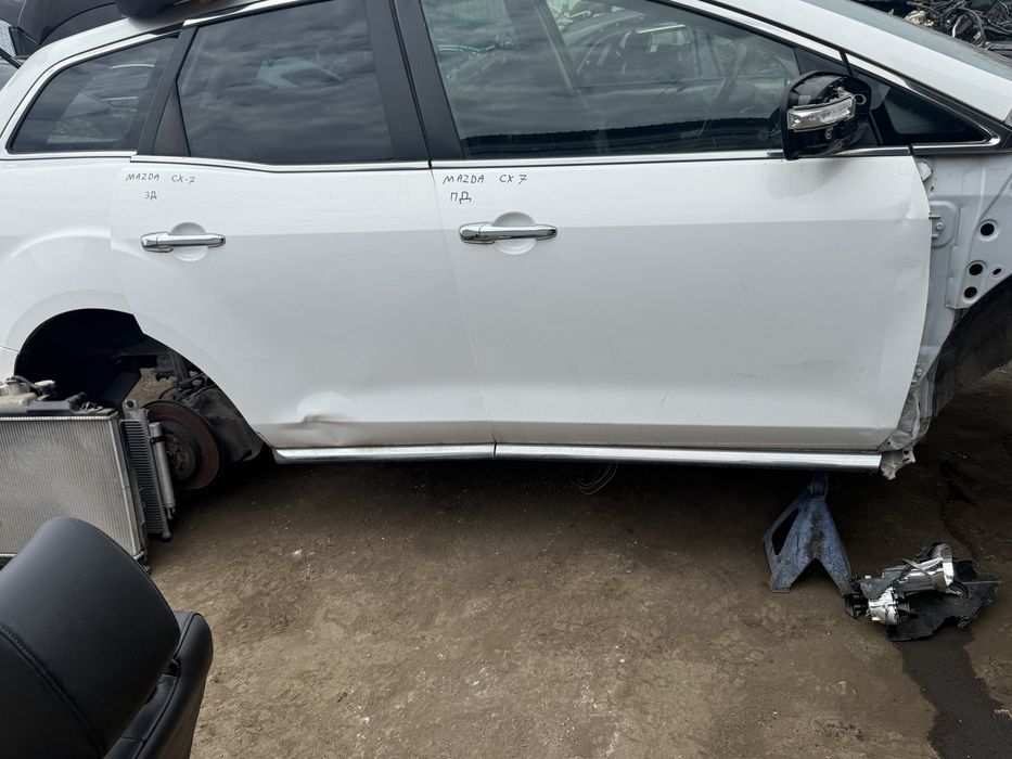 На части Mazda CX7 CX-7 2.2CD Ляв калник Броня задна капак заден врати