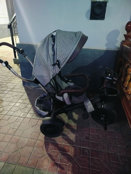 Bolalar uch oyoqli velosiped kolyaskasi