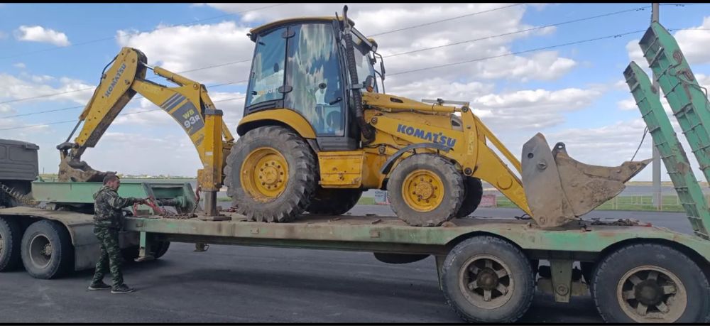 Эксковатор погрузчик 3в1