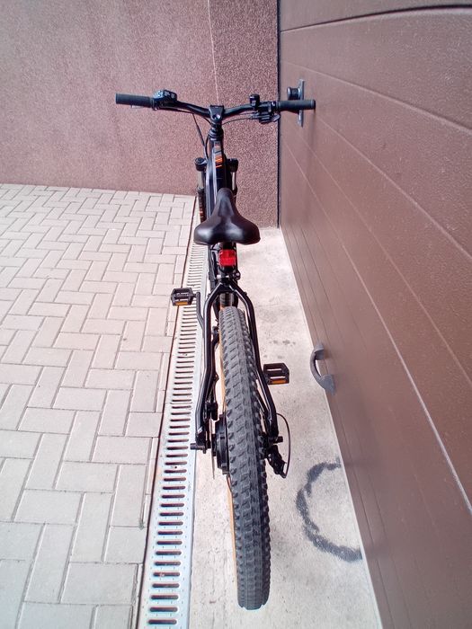 Vand bicicleta electrica MTB ,  Rockrider E-ST 500, pt.  copii 8-12 ani  sau adulti cu inaltimea maxima 1.65 m