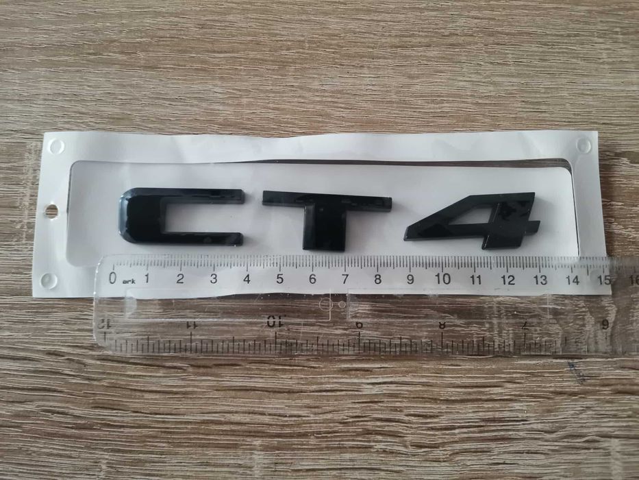 черно лого Cadillac CT4