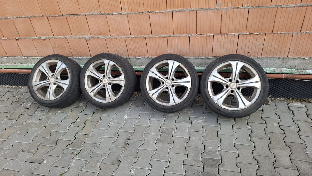 Set jante aliaj cu gume de vară uzate