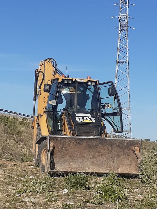 Услуги экскаватора погрузчика