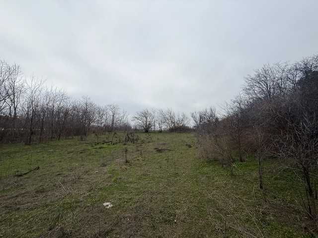 Имот в регулация 2542 кв.м | Лице към три улици | ВиК – с. Хърлец