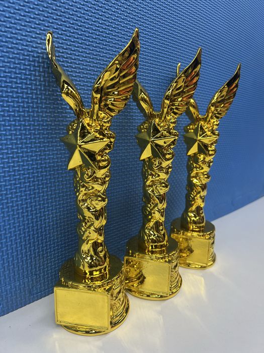 Статуэтки кубки медали награды