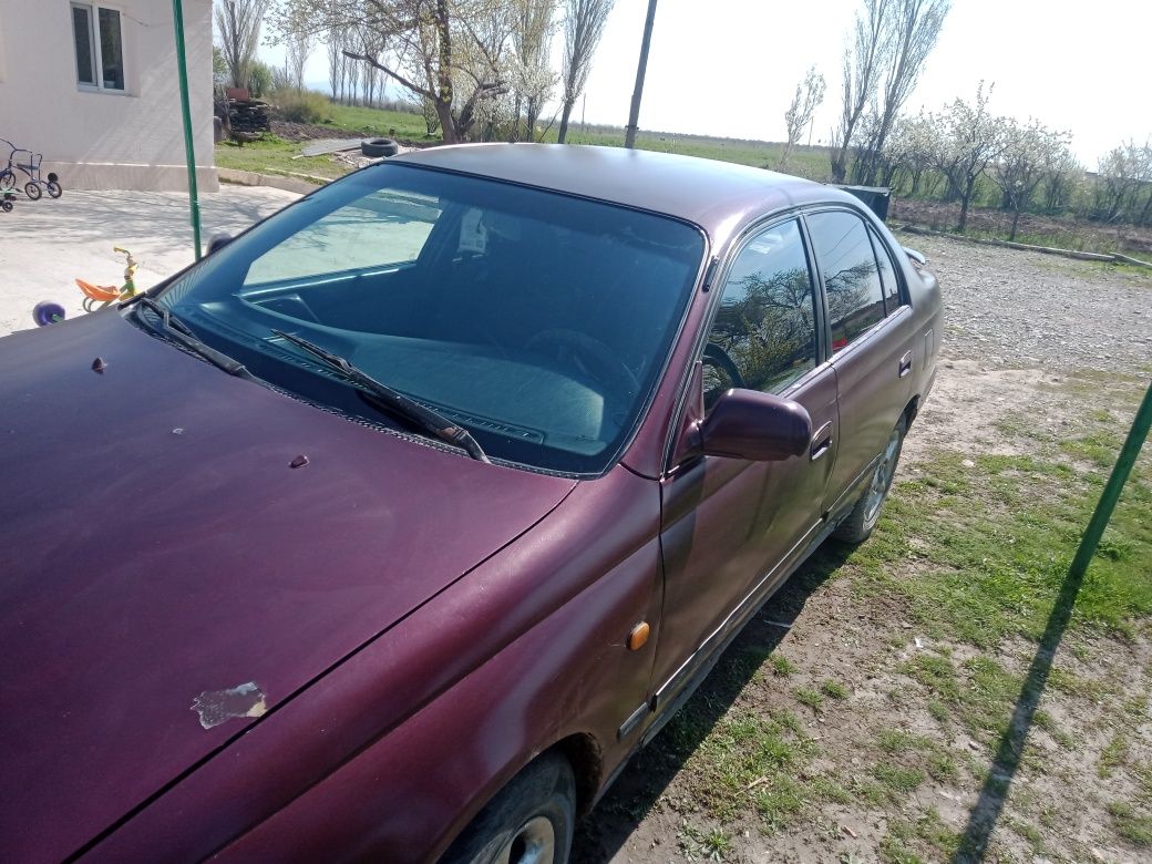 Фото Тойота Карина (Toyota Carina)