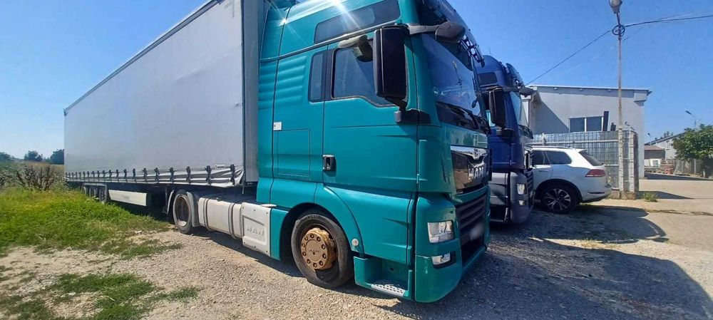 Ansamblu MAN TGX + Semiremorcă KRONE cu prelată la un Preţ PROMOŢIONAL