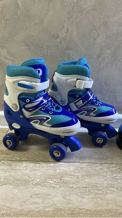 Продам ролики квады со шлемом