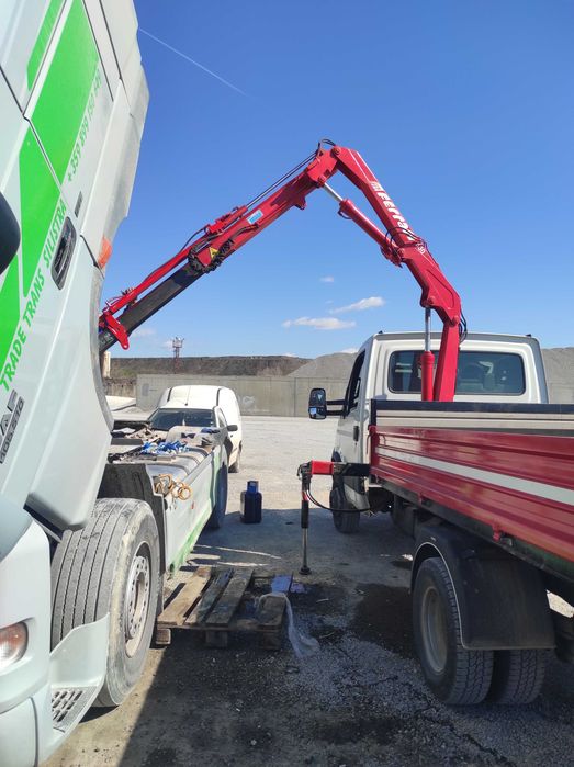 Транспортни услуги.Тристранен самосвал с кран