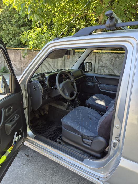 Suzuki Jimny 1.3 cu AC (aer condiționat)