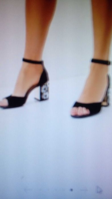 Продам новые босоножки