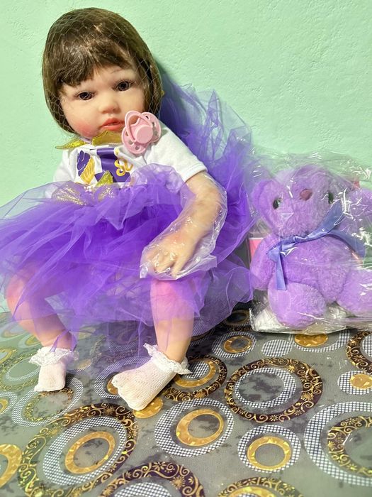 Păpușa realistică