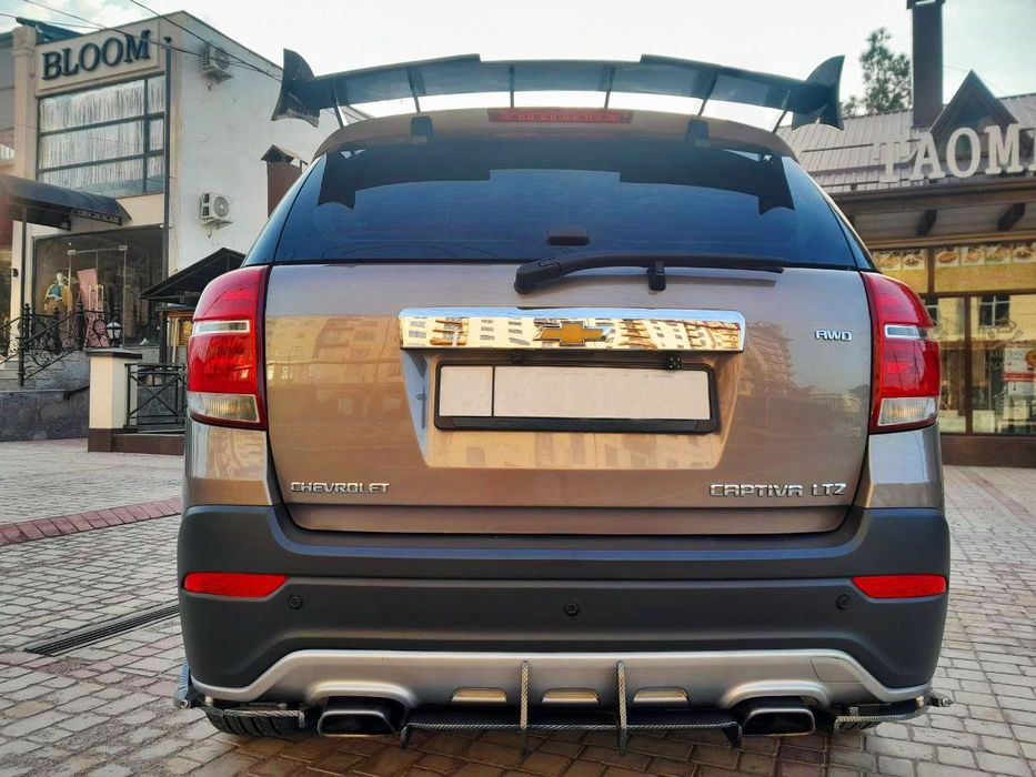 Продам  тюнигованные спойлера  на каптиву