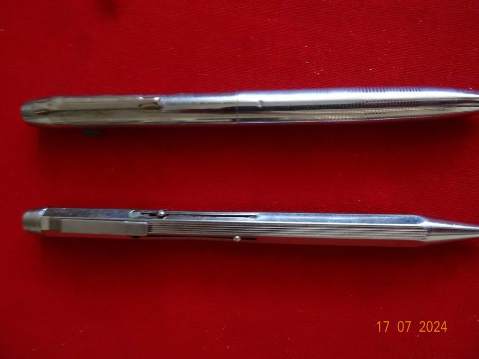 Doua pixuri metalice(cu 4 si 2 culori) ,din anii 1970
