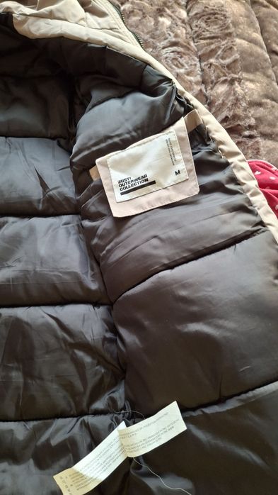 Мужской пуховик бежевого цвета удлененный