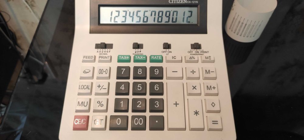 Citizen CX-121N - печатающий калькулятор.