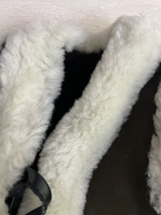 Меховые жилетки