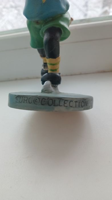 Фигурка обезьянка хоккеист