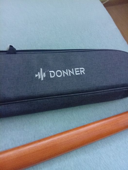 Продавам електроакостична китара    DONNER