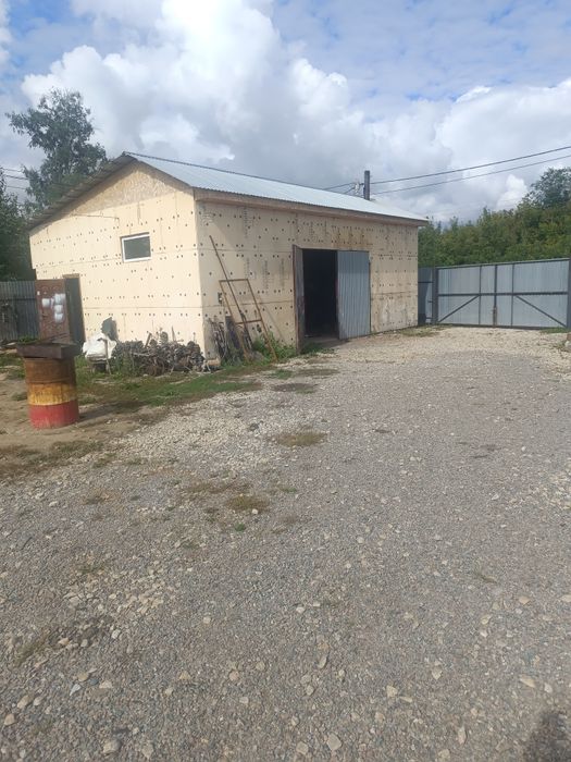 Участок . Тепличное  с гаражом.