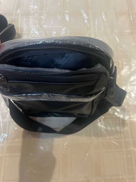 Барсетка чёрная, новая в упаковке
