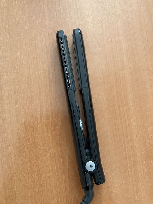 Преса за изправяне на коса на Rowenta