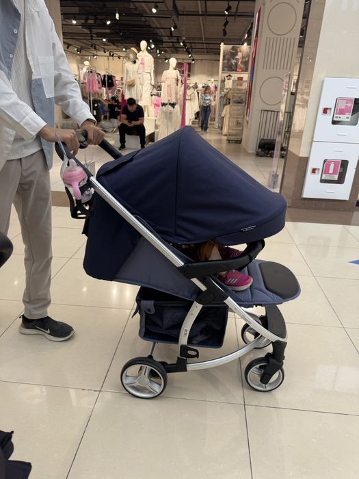 Продам детскую коляску темно синий
