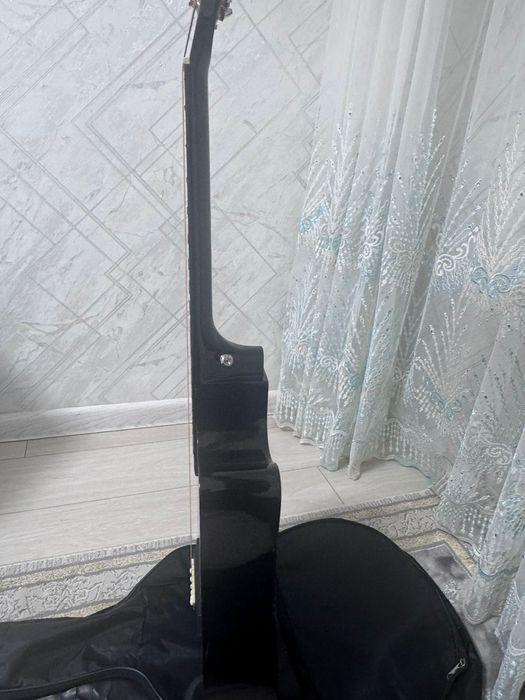 Гитара жағдайы жақсы