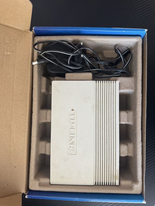 Отдам за шоколадку модем TP-LINK TD-8810