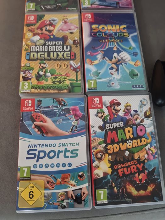 Nintendo Switch OLED + Dock + Pro Controller + 8 игри + куфарче