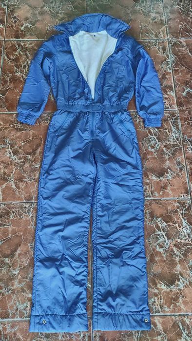 Vand costum de schi bleu sidefat.